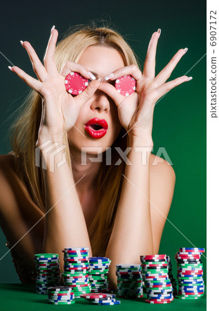 Woman in casino playing cards 6907172