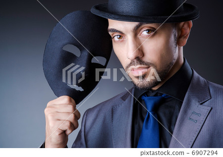 Man with black mask in studio Man with black mask in studio 6907294