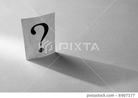 question mark on the paper and the light beam 6907377