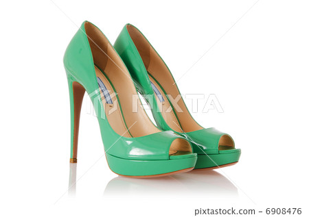 Woman green shoes isolated on white Woman green shoes isolated on white 6908476