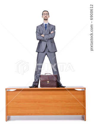 Young businessman isolated on the white Young businessman isolated on the white 6908612