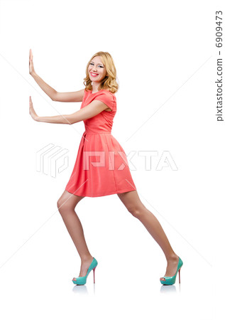 Woman in fashion clothing on white 6909473