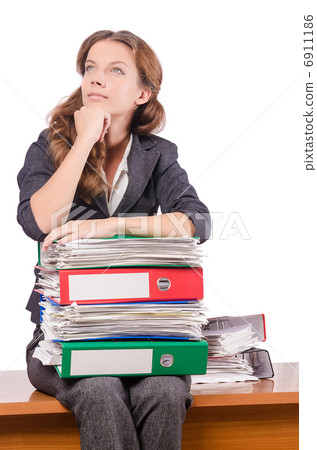 Businesswoman with lots of folders Businesswoman with lots of folders 6911186