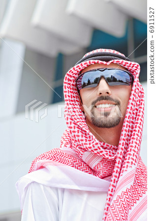 Arab on the street in summer Arab on the street in summer 6911527