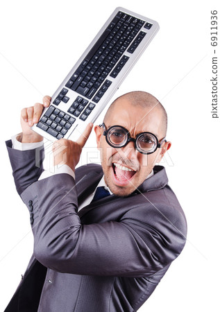 Nerd businessman with computer keyboard on white Nerd businessman with computer keyboard on white 6911936