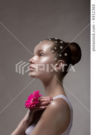 Bronze Body Art. Profile of Brown Tanned Woman's Face. Creative Futuristic Portrait Bronze Body Art. Profile of Brown Tanned Woman's Face. Creative Futuristic Portrait 6912368
