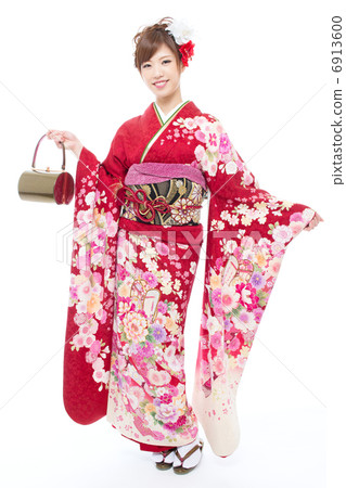 Woman in long-sleeved kimono Woman in long-sleeved kimono 6913600