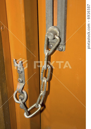 Old apartment door chain 6916387