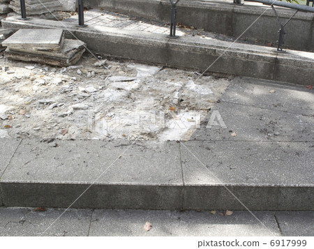 Re-installation of sidewalk tiles 6917999