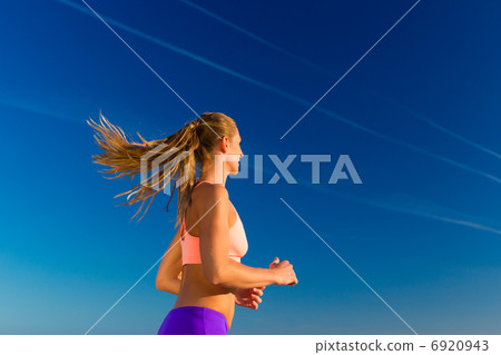 Sport and Fitness - woman jogging Sport and Fitness - woman jogging 6920943