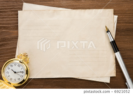 watch and ink pen at envelope watch and ink pen at envelope 6921052
