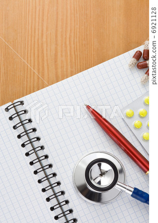 medical stethoscope with pills 6921128