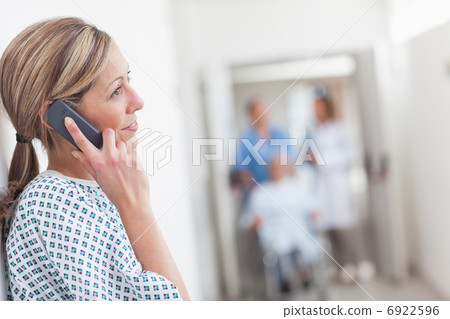 Patient calling in a hospital corridor Patient calling in a hospital corridor 6922596