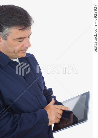 Mechanic using tablet computer Mechanic using tablet computer 6922927