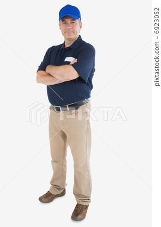 Mature courier man with arms crossed Mature courier man with arms crossed 6923052