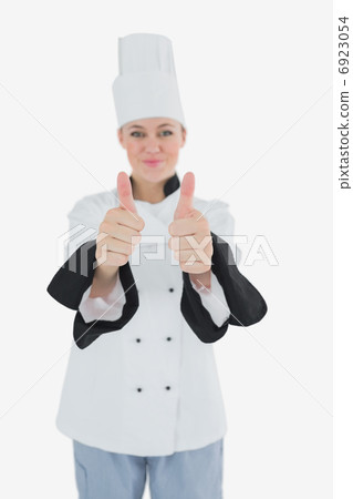 Chef showing thumbs up sign Chef showing thumbs up sign 6923054