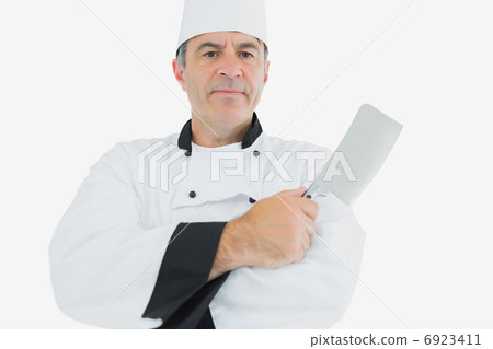 Chef holding meat cleaver 6923411