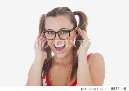 Happy young woman listening music Happy young woman listening music 6923446