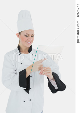 Female chef with glass tablet Female chef with glass tablet 6923755