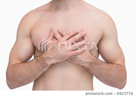 Midsection of shirtless man with chest pain Midsection of shirtless man with chest pain 6923758