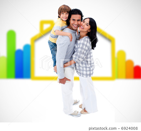 Happy family standing with an energy efficient illustration 6924008