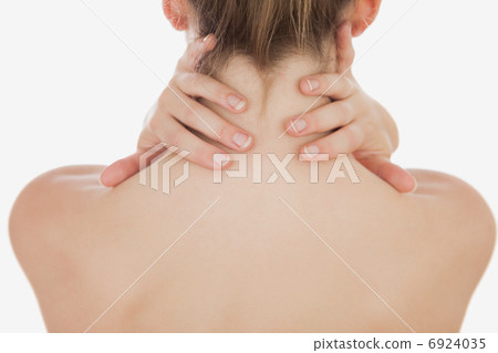 Woman massaging neck 6924035