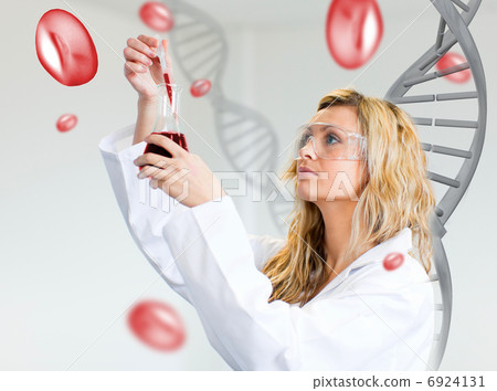 Female scientist examining blood 6924131