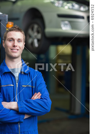 Smart car mechanic smiling 6924552