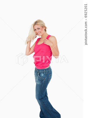 Portrait of happy casual young woman with blonde hair Portrait of happy casual young woman with blonde hair 6925201
