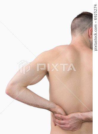 Rear view of shirtless man with backache Rear view of shirtless man with backache 6925274