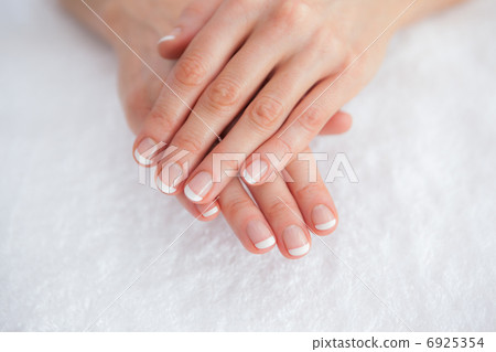 French manicured fingers at spa center 6925354