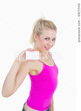 Portrait of beautiful woman holding blank card Portrait of beautiful woman holding blank card 6925549