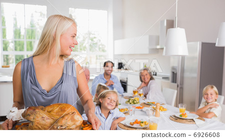 Woman looking her family Woman looking her family 6926608
