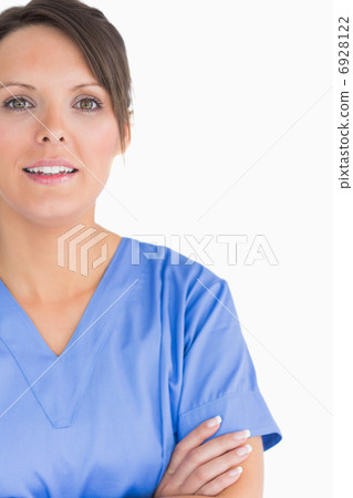 Portrait of smiling nurse with arms crossed Portrait of smiling nurse with arms crossed 6928122