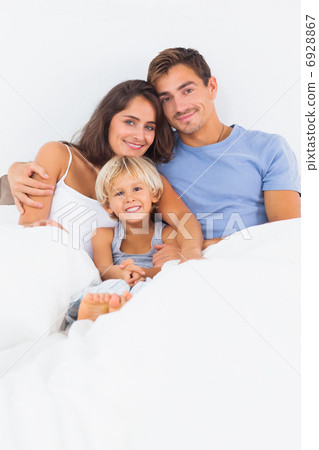 Lovely family embracing 6928867