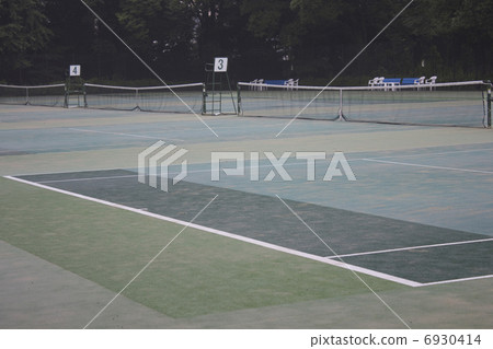 Tennis court wet in the rain Tennis court wet in the rain 6930414