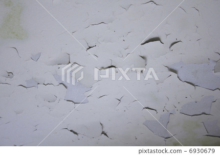 Paint that peeled off ceiling of old building 6930679