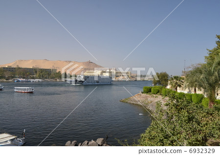 The Nile River near Aswan where a large cruise ship goes The Nile River near Aswan where a large cruise ship goes 6932329