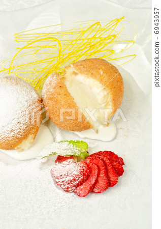 Dessert of ice-cream at biscuit 6943957