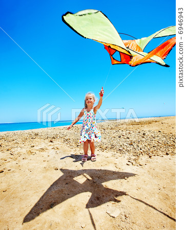 Kid flying kite outdoor. Kid flying kite outdoor. 6946943