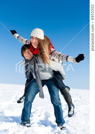 Couple having a winter walk 6955502