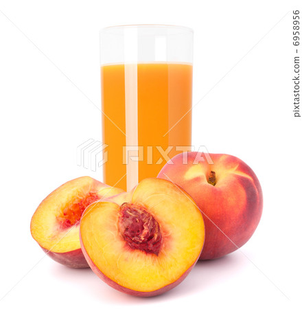 Peach fruit juice in glass 6958956