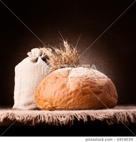 Bread, flour sack and ears bunch still life Bread, flour sack and ears bunch still life 6959039