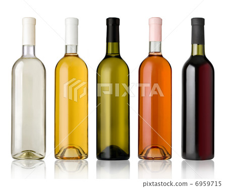 Set of white, rose, and red wine bottles. 6959715