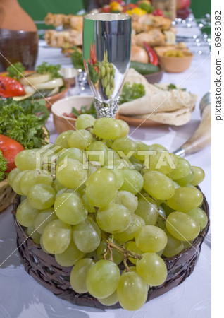 Green grapes in basket. Green grapes in basket. 6963082