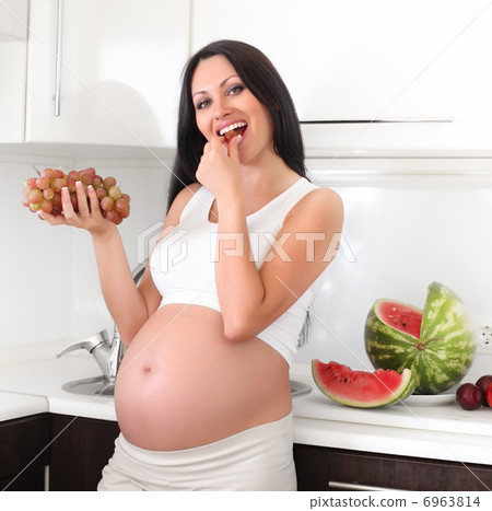 pregnant woman with fruits pregnant woman with fruits 6963814