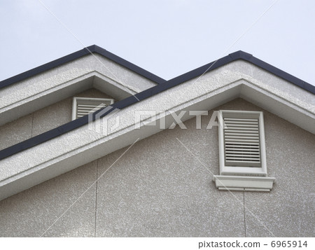 Ventilation opening in the attic of the house 6965914