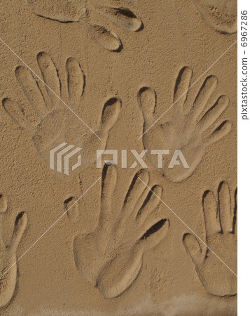 A molded wall of a human hand 6967286