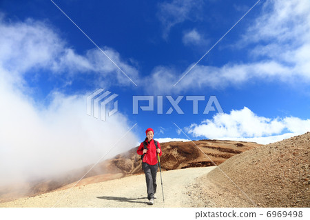 Hiking in clouds Hiking in clouds 6969498