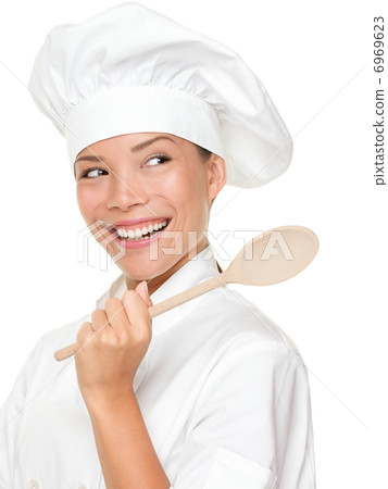 Chef woman smiling happy 6969623